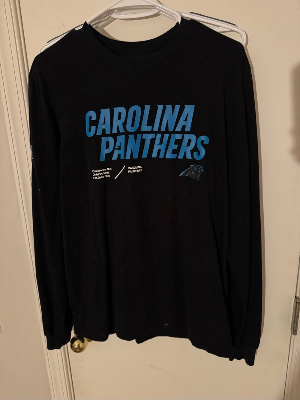 Nike Black Crewneck Long Sleeve Shirt with Blue Carolina Panthers Logo